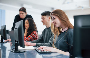 computer-screens-group-young-people-casual-clothes-working-modern-office.jpg