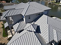 Professional roofing project completed in Naples, FL by Craft Roofing, showcasing quality workmanship and attention to detail.