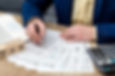 tax-time-male-hands-filling-1040-form_359031-13359.jpg