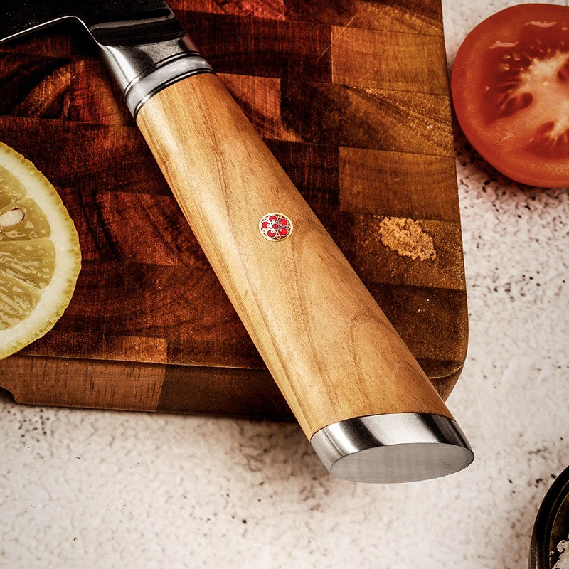 Thumbnail: 67-layer Damascus steel 8" chef knife with olive wood and resin handle, designed for precision slicing of vegetables, meat, a