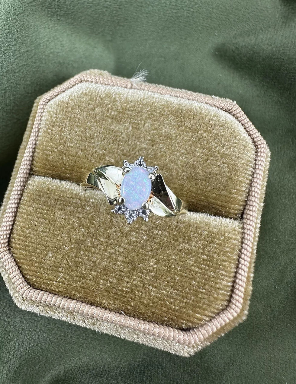 Thumbnail: .2ct Opal ring 10k yellow gold size 7.25 Accenting Diamonds