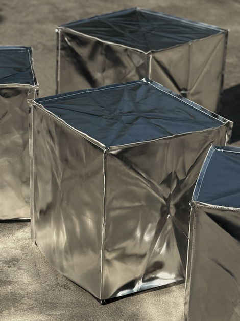 Metallic cube stool with faux-leather seat – modern seating for wedding ceremonies, lounges, and events in Mykonos.