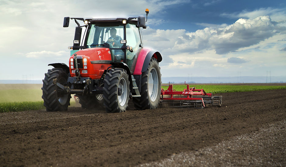 Red Tractor in Field