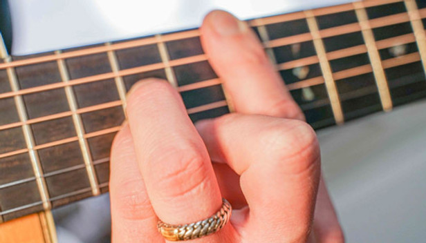 Barré akkoord gitaar voorbeeld vingerzettingen