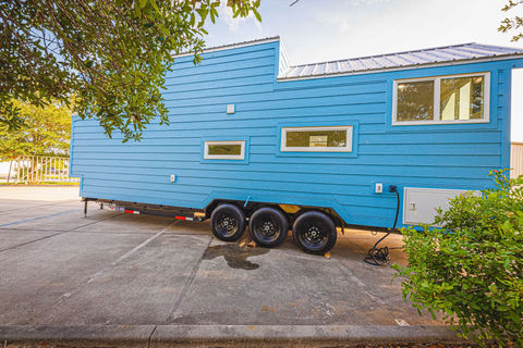 Cavin tiny home by Movable Roots with LP LapSiding.