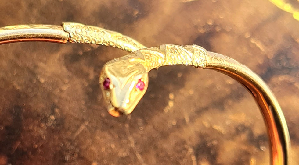 Thumbnail: Vintage 9ct Gold Ruby Eyed Snake Bangle
