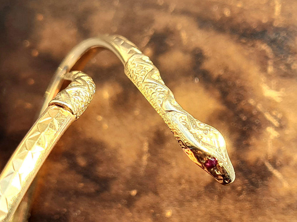 Thumbnail: Vintage 9ct Gold Ruby Eyed Snake Bangle