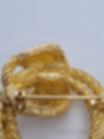 Thumbnail: Vintage 1970’s Christian Dior Gold Plated Textured Crystal Knot Brooch Pin