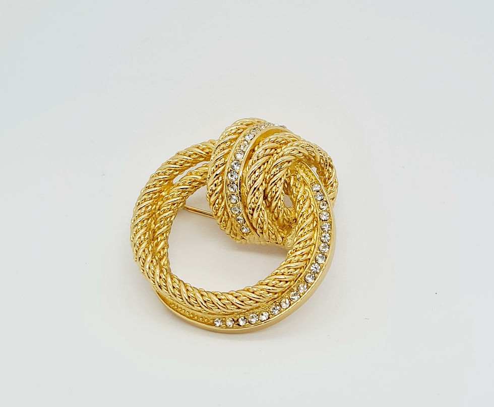 Thumbnail: Vintage 1970’s Christian Dior Gold Plated Textured Crystal Knot Brooch Pin