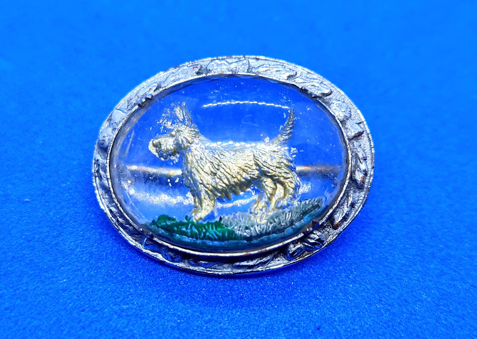 Thumbnail: Lucite reverse carved art deco brooch.