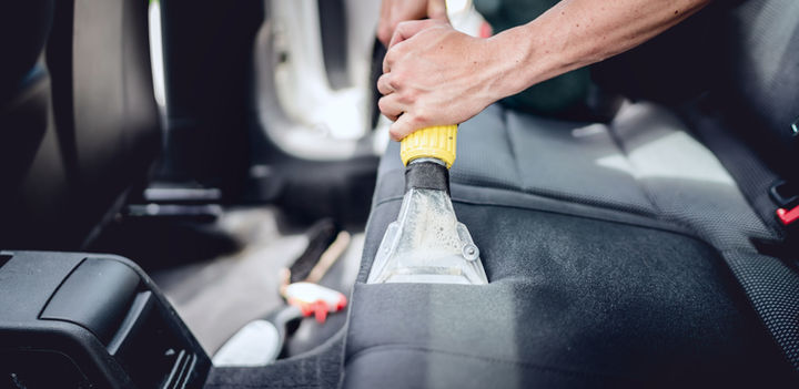 Professional deep cleaning on seats with shampoo extraction