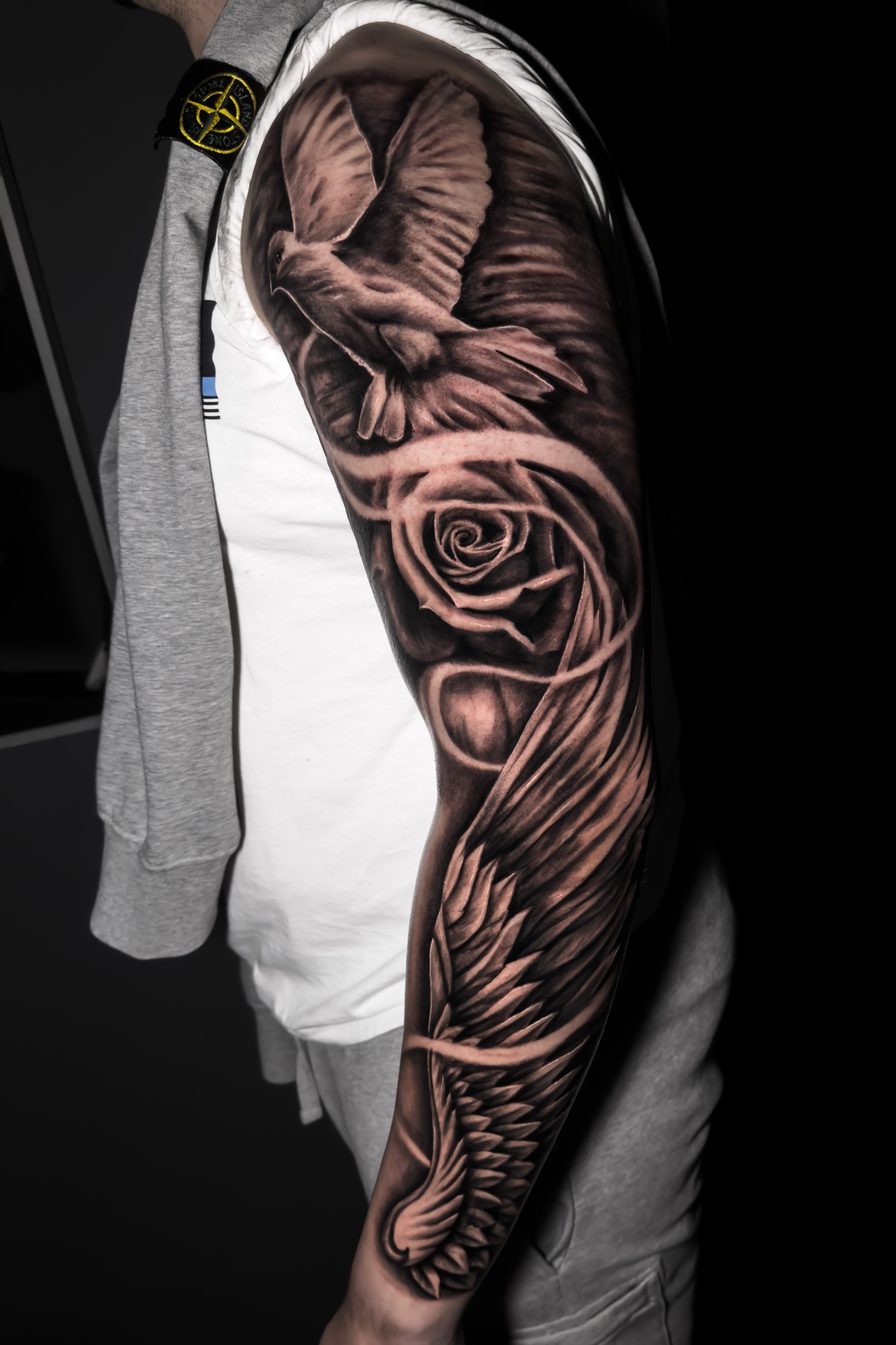 Noel - Black &amp; grey dove and roses arm sleeve tattoo - Studio 51 Ink Tattoo Studio - East 