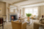 Modern fireplace with marble-look surround and custom mantel