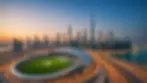 Wide angle view of the magnificent Abu Dhabi skyline with a prominent stadium