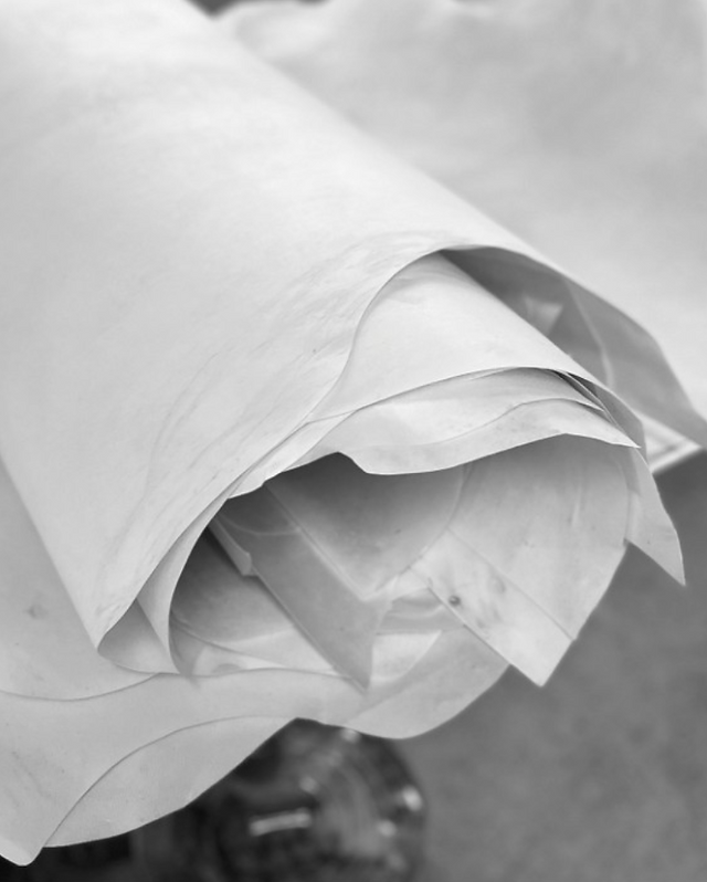 Parchment raw material being finished for Antonia luxury lighting collection for Fine Art Handcrafted Lighting at Rebecca Scott