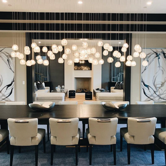 natural inspirations rectangular drop pendant above a dining table