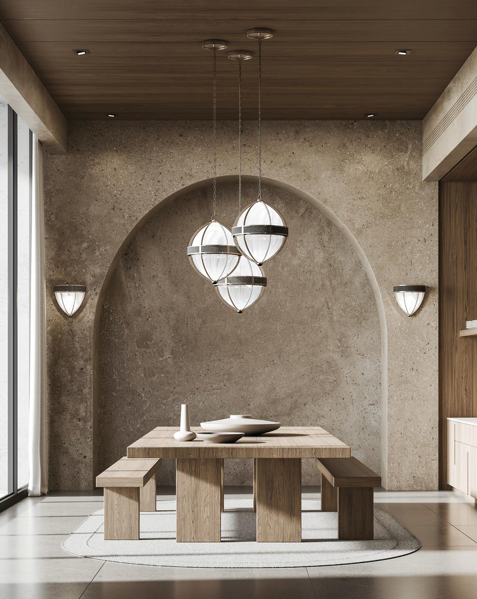 Mirage round ceiling pendant grouping hanging above a dining table with benches in an open plan dining room