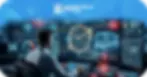 A professional dispatcher wearing a headset sits before a multi-monitor workstation. The central screen displays a glowing digital clock and a semi-truck graphic, symbolizing "The Algorithm & Driver Assignment Support (DAS)" with real-time tracking data and ELD gauges.