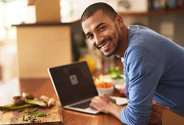 Satisfied happy businss owner working on laptop to drive businss innovation.