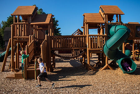 kids running in front of playground