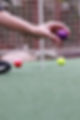 hand holding mini golf ball