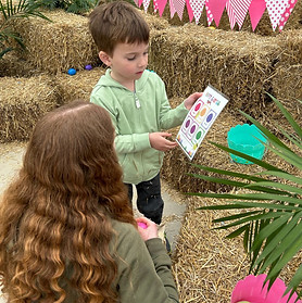 kid playing egg matching game