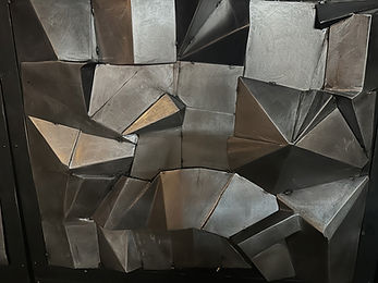 Custom metalwork and design service from 3D SolidWorks drawing to final installation – artistic metal wall sculpture for bars in NYC and Boston