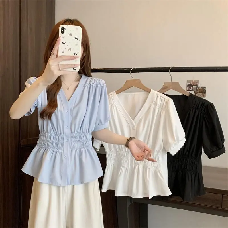 Elastic waist cinching and slimming shirt