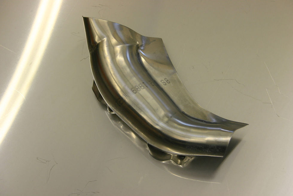 Pressed exhaust parts