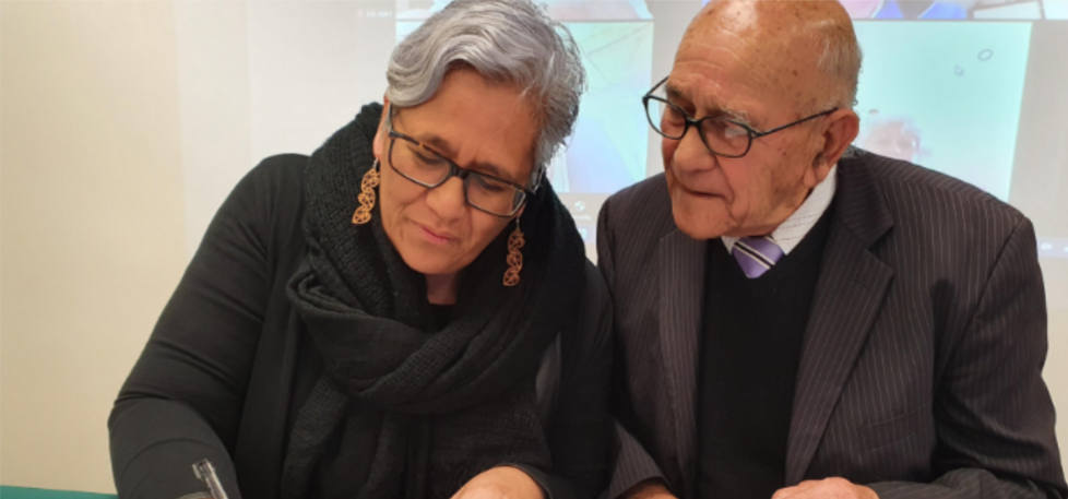 Margareth Broodkoorn signs her contract as the new chief executive officer of Hokianga Health Community Trust, with trust chair Frank Herbert