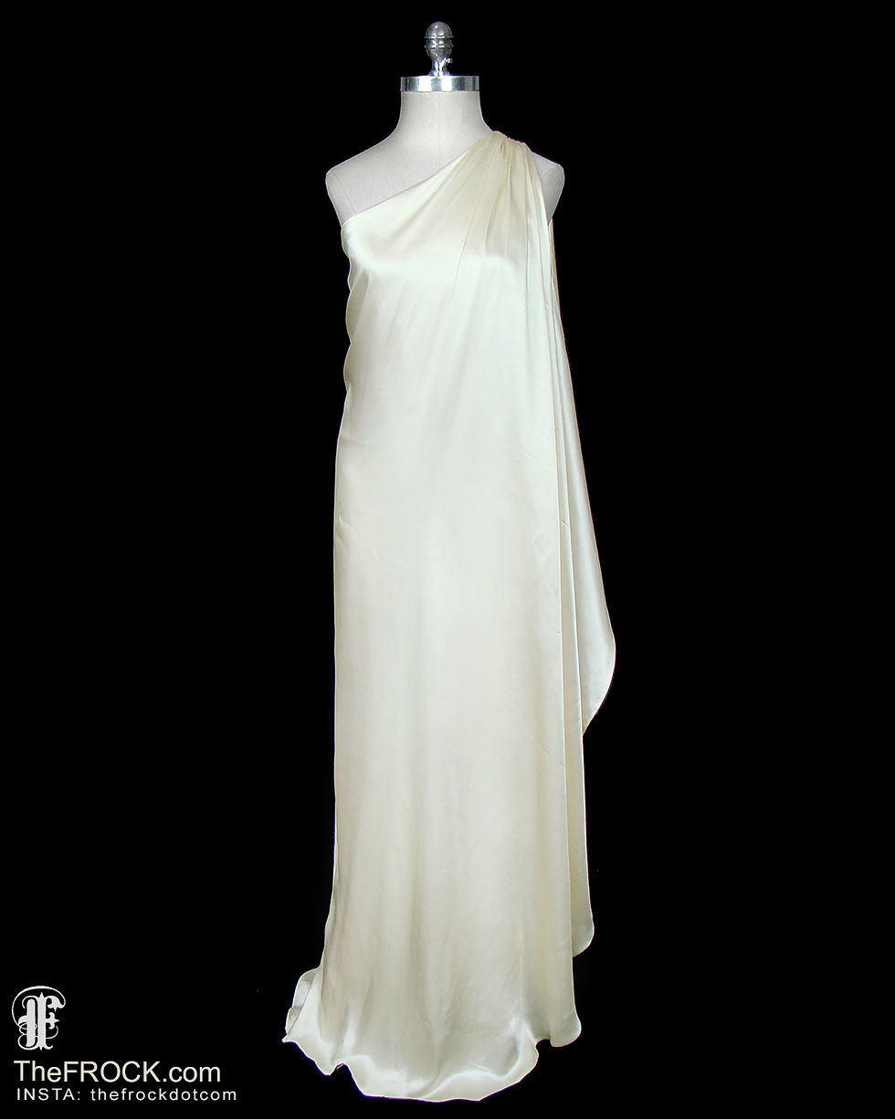 A classical vintage Halston ivory charmeuse satin single-shoulder toga gown or wedding dress.