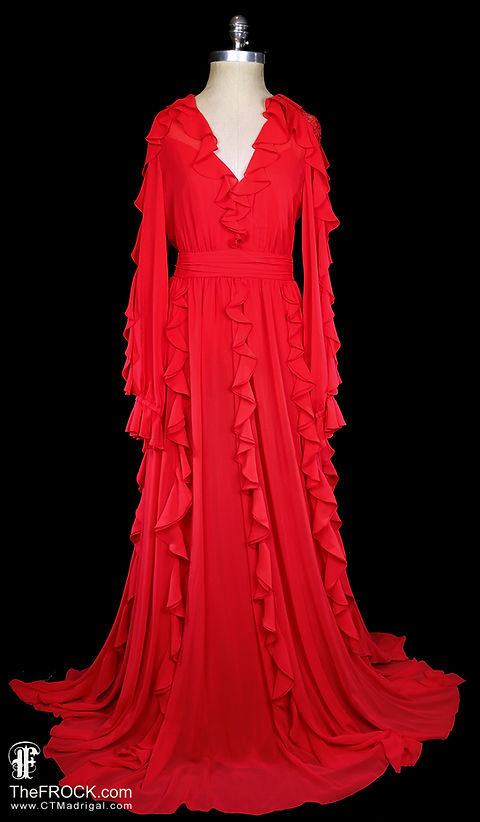 red dress zuhair murad razanejammal wears a figure-hugging dark red embroidered gown with a plunging neckline and sensual waist cut-outs from the ZUHAIR MURAD Ready-To-Wear Fall 2025 collection to the Red Sea Film Festival Women In