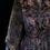 Thumbnail: 1940s black toile patterned coat or dressing gown with stenciled fur trims.