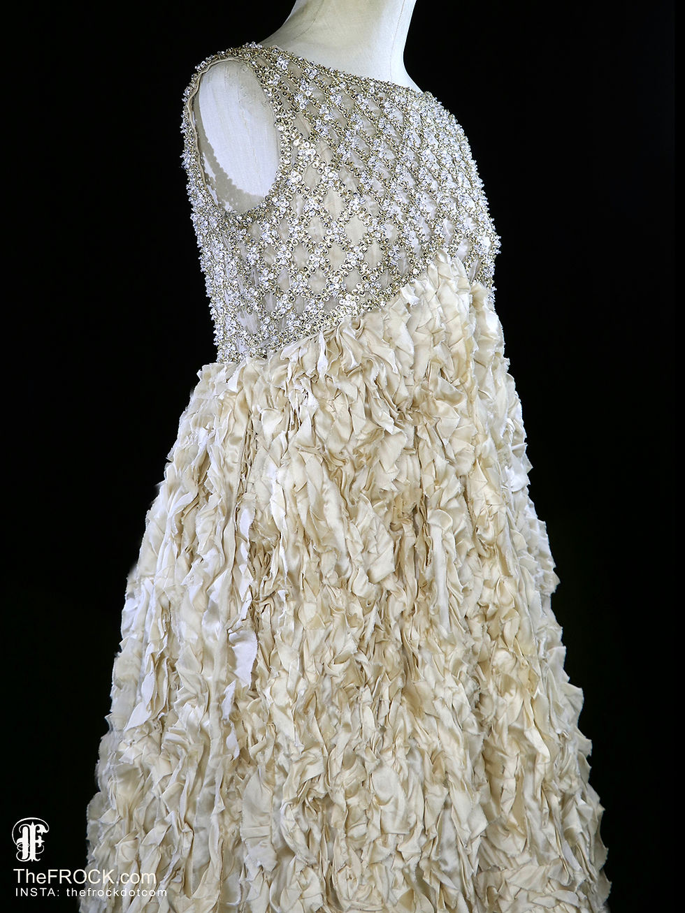 ADOLFO vintage 1960s couture dark ivory or pale beige party dress with sleeveless rhinestone bodice and endlessly confectionary ruffled skirt.
