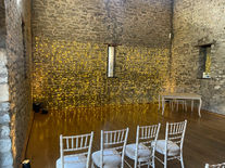 Fairy light curtain with warm uplighting