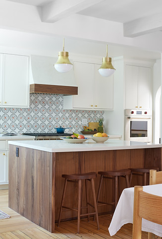 traditional kitchen with painte dflower tile backsplash