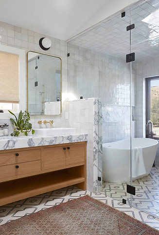 modern black and white tiled bathroom with wet room