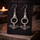 Thumbnail: The Nightward Relics™ – Bat & Moon Earrings