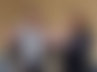 Asian man and white woman talking and using hands