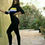 Miniatura: Jumper negro completo con cierre al ombligo, tres lineas, azul, blanca y amarill