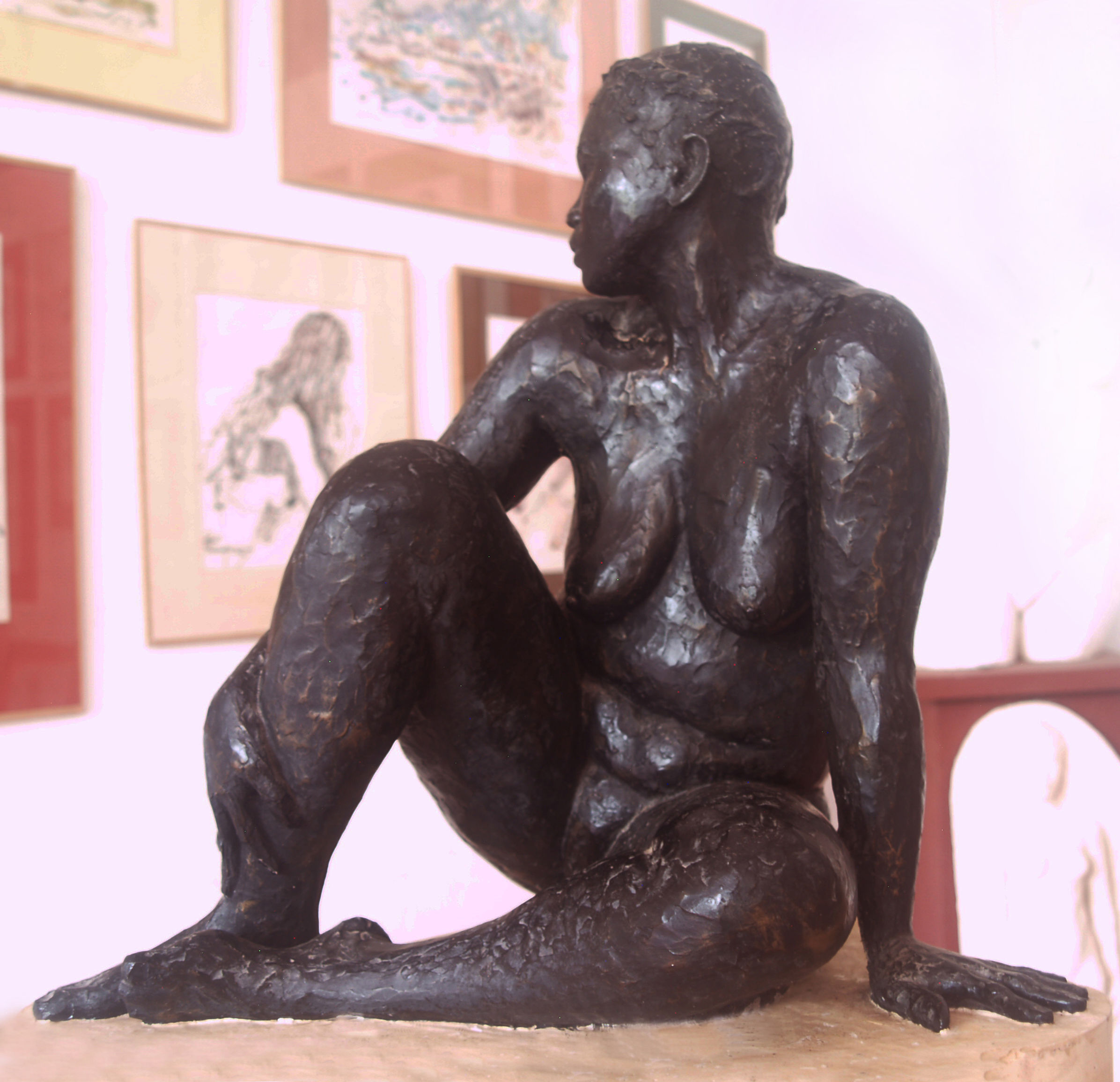 Half lifesize seated figure