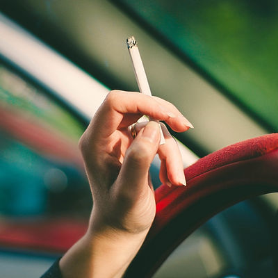 Woman Holding Cigarette