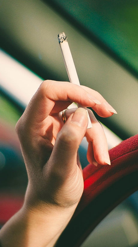 Woman Holding Cigarette