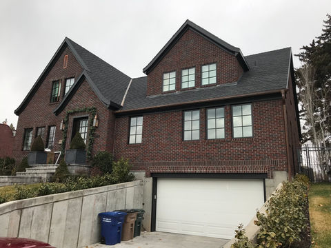 Two-Story Brick House with Landscaped Yard