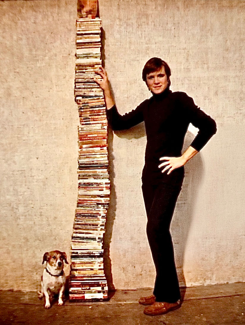 In 1976, Kevin gathered 300 books from the CSDR library and Rialto library for this picture. He had read all the books for fun during his high school years. The family dog (Princess) was Kevin’s reading buddy.