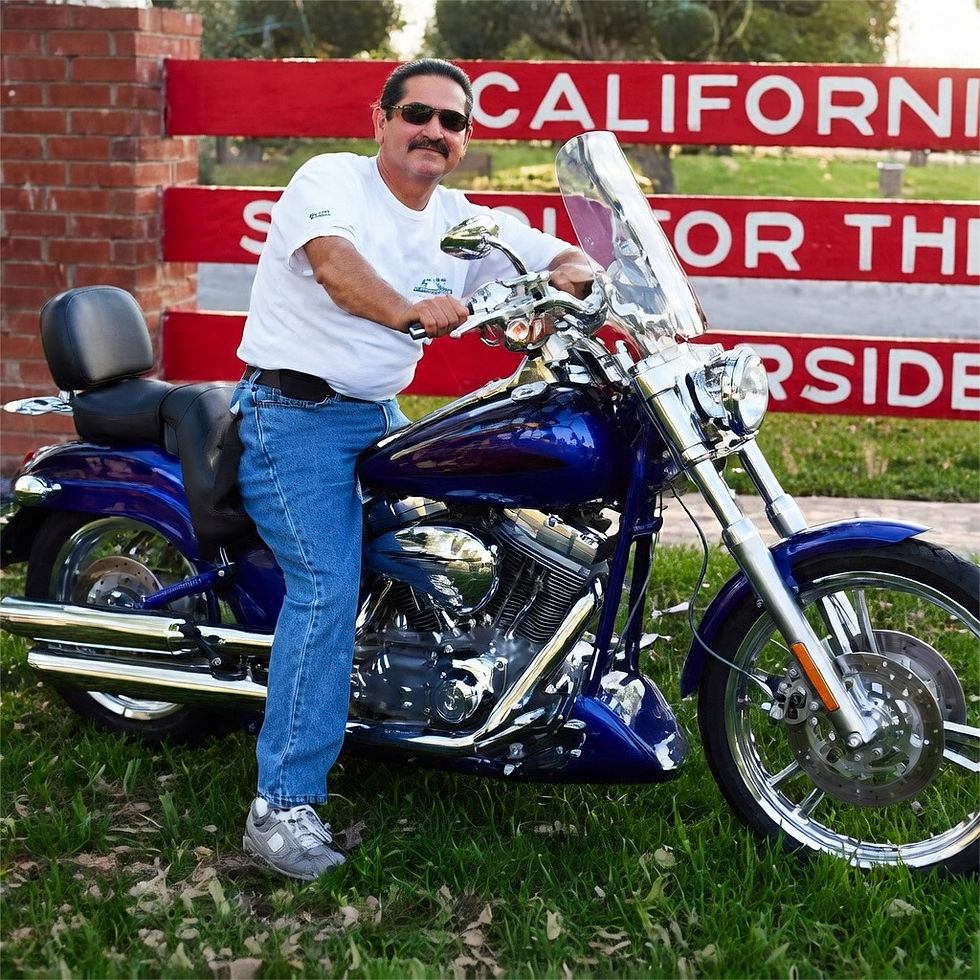 Daniel takes pride in owning and repairing a Harley Davidson. He sits in front of the old landmark entrance sign. He can’t forget his 14-year root at CSDR.
