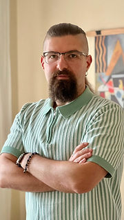 Toledo Koti - Professional Profile Photo, Owner / Co-Founder at PeoplePath Consultancy - a colorful portrait photo with a formal tone - image part of the website's about/team section