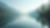 Eye-level view of a calm lake reflecting a clear sky