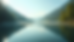 Eye-level view of a calm lake reflecting a clear sky