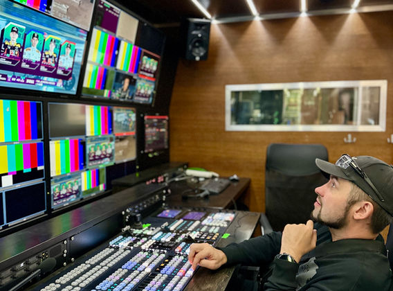 Master control room operations during international sports broadcast